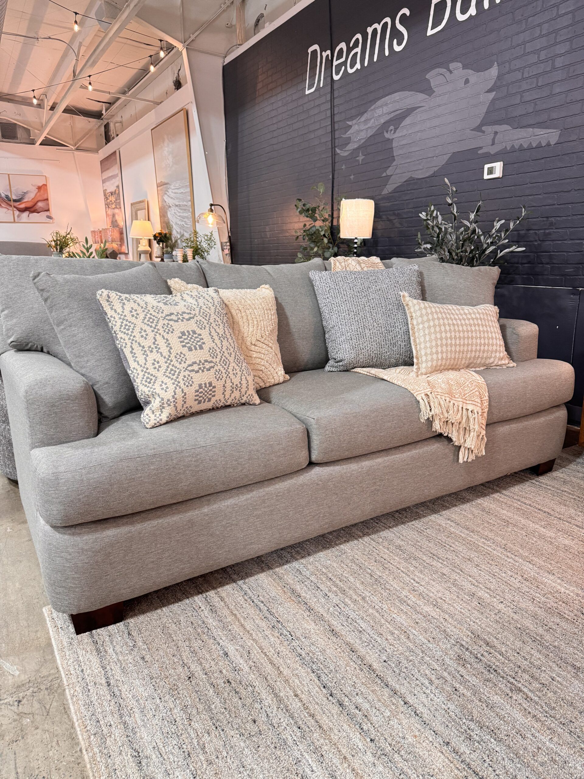 grey upholstered 3 seat sofa couch